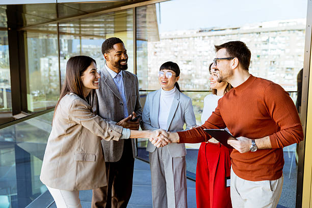 istock Engaging business meeting with diverse professionals exchanging ideas in a modern office setting 2206982488