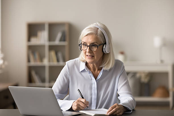 Female listening course, take part in educational webinar
