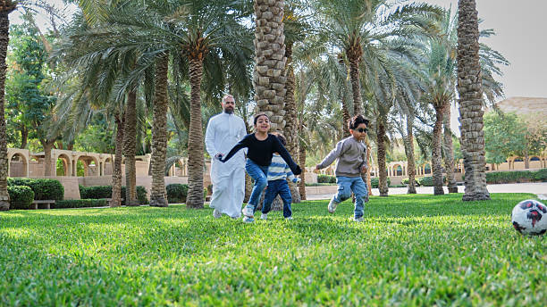 istock Fun soccer game at the park in Riyadh 2206983893