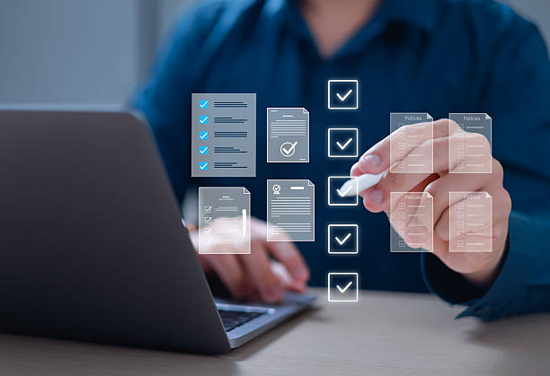 istock Policy Documents and Legal Compliance Concepts Individuals will review digital documents, checklists, certificates, and financial details. Policy Management Legal Compliance 2206985934