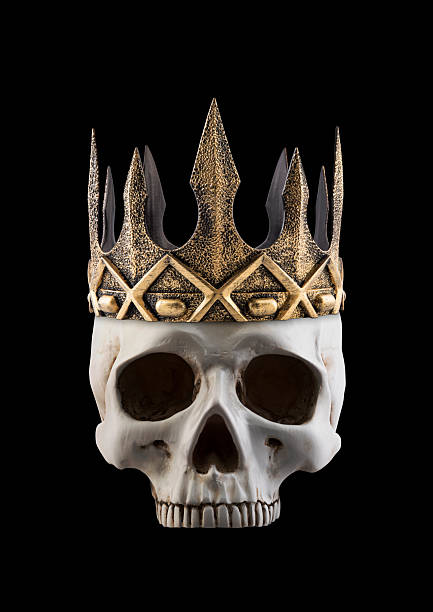 istock Human skull with ancient golden crown isolated on black background 2206986967