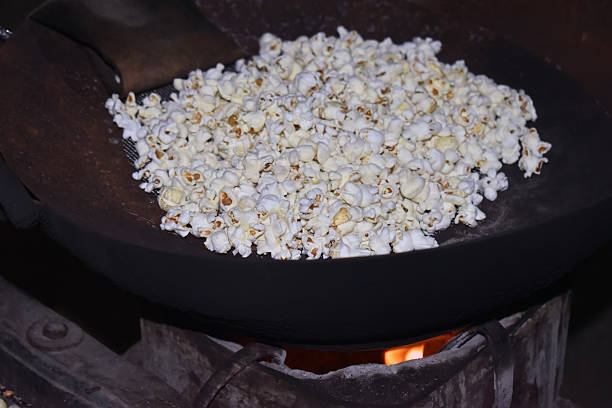 istock salted popcorn cooking on big pan 2206989025