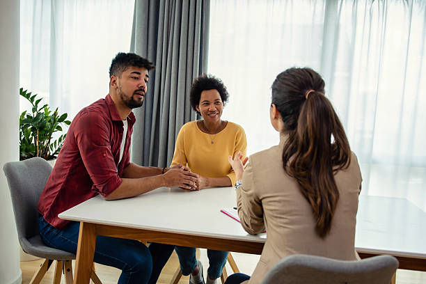 istock Black couple with a financial advisor 2206990780