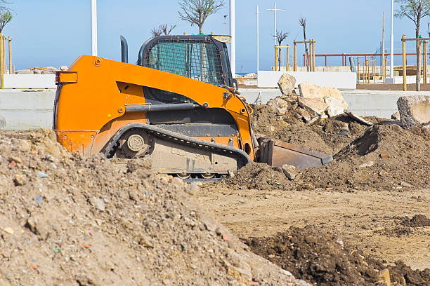 istock CONSTRUCTION SITE WITH EXCAVATOR - Open-pit mining - Heavy construction equipment on excavation on construction site - Excavator on groundwork for earth removal 2206996900