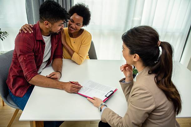istock Black couple with a financial advisor 2206997547