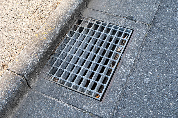 istock A metal mesh cover for drainage into a gutter 2206997660
