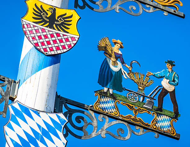 Bad Aibling, Germany - October 30: typical bavarian maypole in front of blue sky in Bad Aibling on October 30, 2024