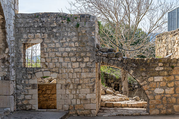 istock Sun-drenched stones, a weathered church, a testament to time's passage. 2206998910