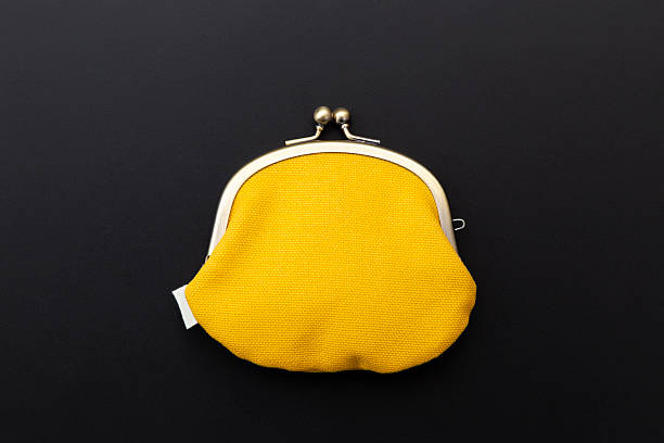 istock Coin purse on a black background. 2206999798