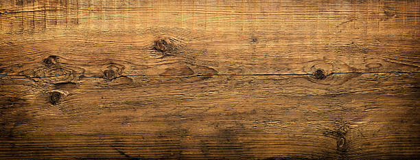 istock brown board as background. dark wood texture 2207004620