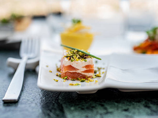 Seared tuna with pistachio on a plate at the restaurant