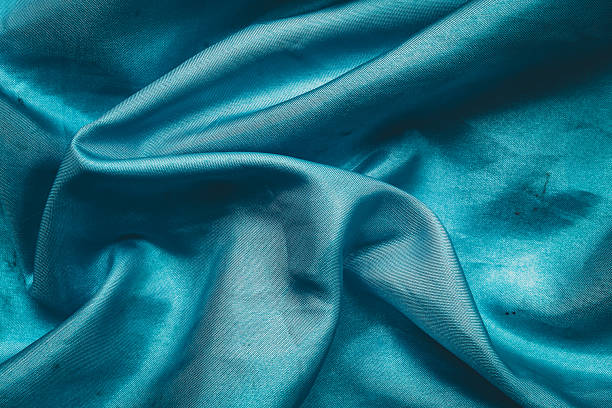 istock texture and background of beautiful dark turquoise fabric 2207010157
