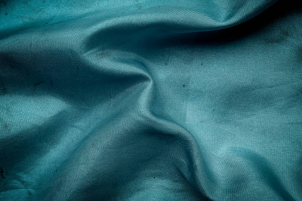 istock texture and background of beautiful dark turquoise fabric 2207010207