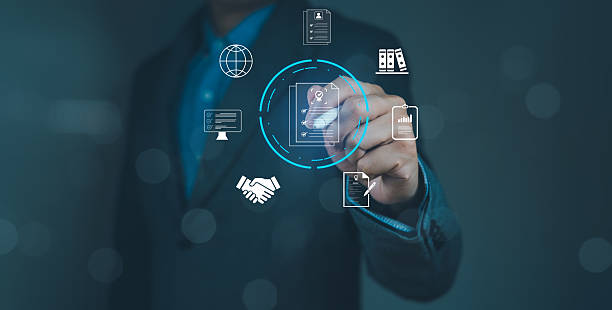 istock A business professional interacts with digital icons, showcasing technology and connectivity in modern work environments. 2207010665