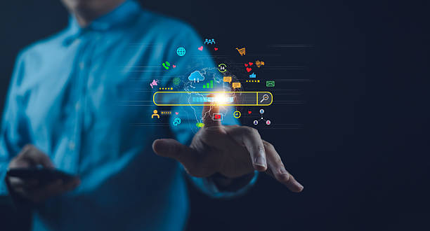 istock A person interacts with a digital interface showcasing various social media and technology icons, symbolizing connectivity and information access. 2207012271