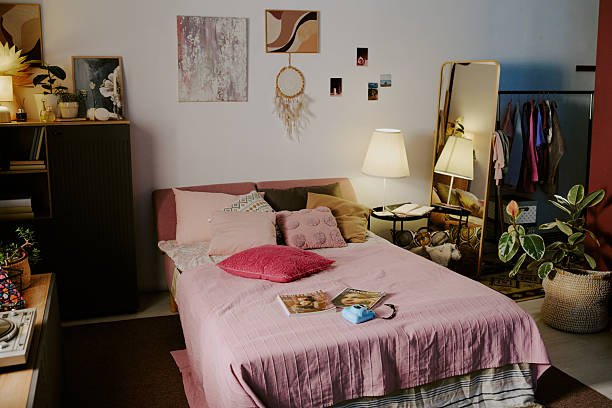 istock Spacious Bedroom with Plants and Decorations 2207013034