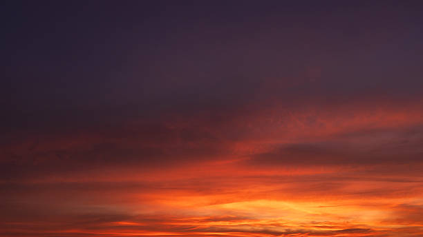 istock Red sky cloud in the evening after
sun dawn on twilight, Dramatic fluffy storm sky cloud sunset, Dusk sky backgrounds 2207014571