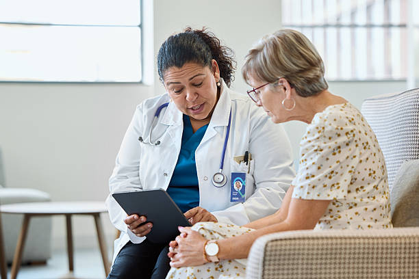 istock Physician explaining medical reports to patient 2207015491