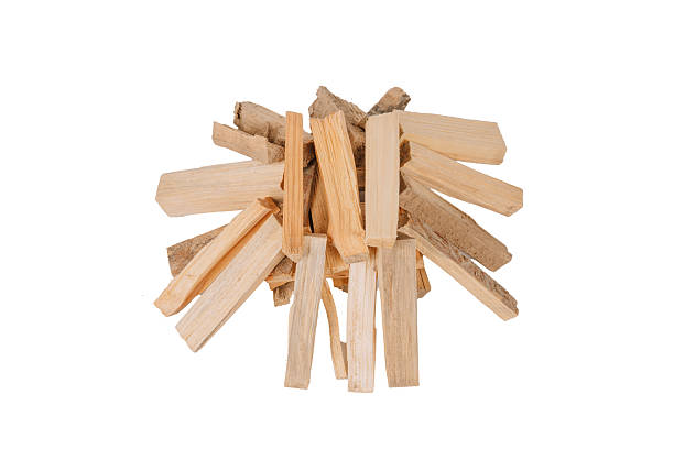 istock Stack of dry kindling wood sticks arranged on a white background, ideal for fire starting. Clean cut, natural texture, and visible wood grain. Copy space. 2207016106