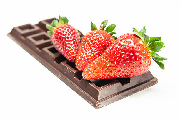 Chocolate dipped strawberry on white background. File contains clipping path.