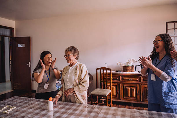 istock Volunteers playing pranks on elderly women in nursing homes 2207018219