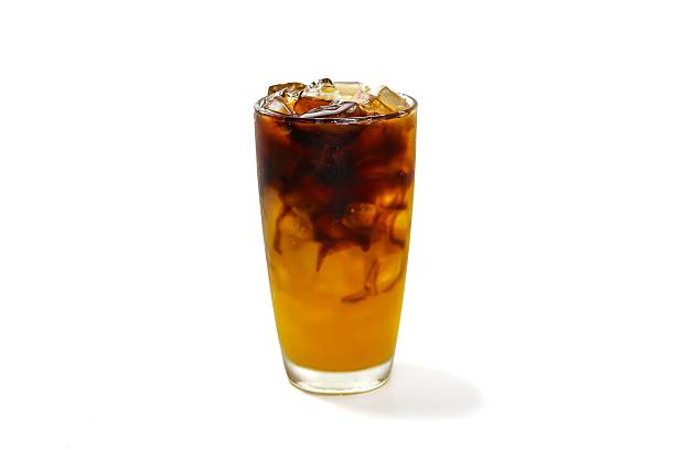 istock Americano ice coffee with orange juice put on white background and isolated coffee concept. 2207018461