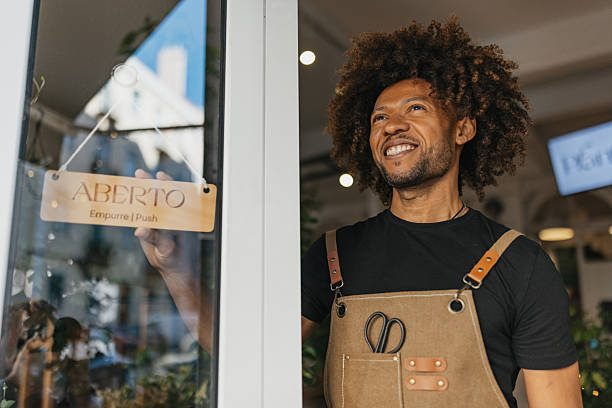 Joyful florist greeting patrons with a smile