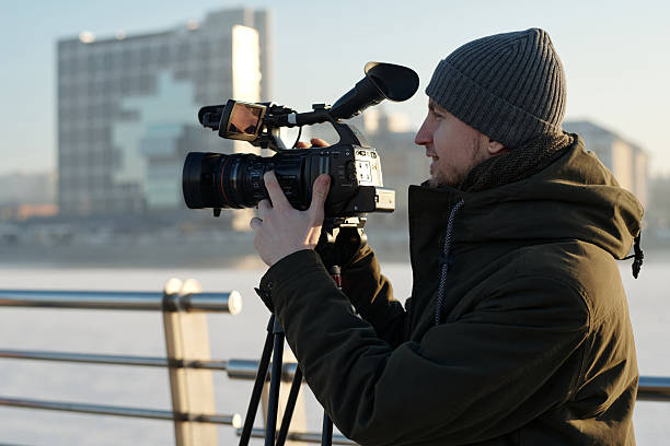 istock Man preparing for shooting new footage 2207022188