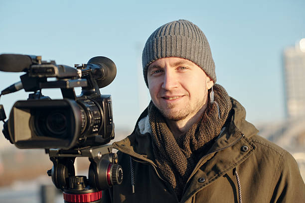 istock Happy young male operator in grey beanie 2207022208