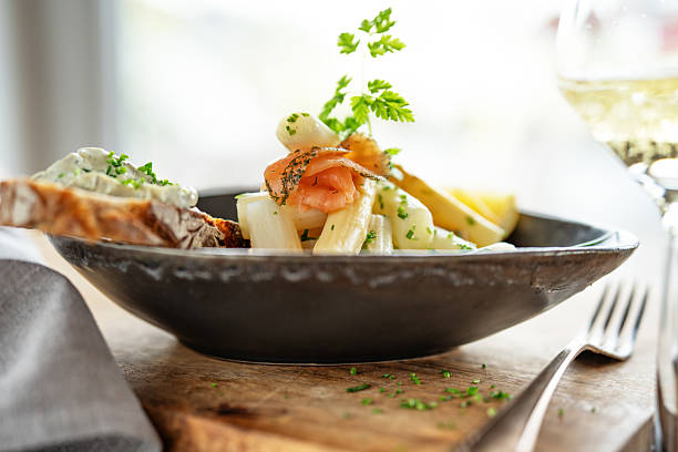 istock Asparagus with fresh ingredients in a bowl 2207022815