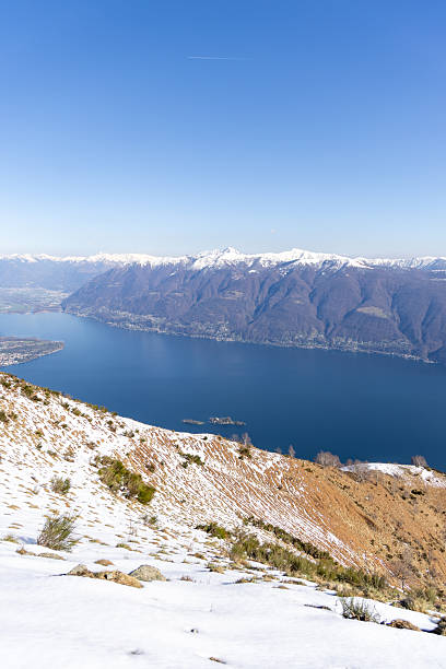 istock Scenic Winter Mountain View Overlooking Serene Lake 2207024409