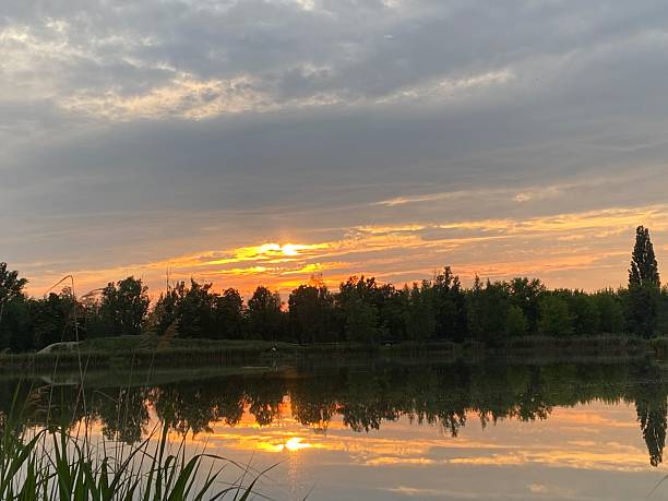 istock Sunset over a pond in Poland 2207025357