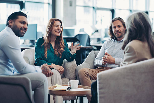 Group of entrepreneurs talking around the table