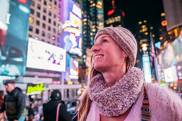 istock Woman Enjoying Illuminated Cityscape at Night 2207025787