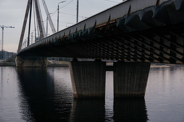 istock A striking perspective of a cable-stayed bridge over a calm river, showcasing urban infrastructure and architectural design 2207027979