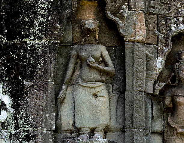istock headless sculpture holding its lotus flower 2207027984