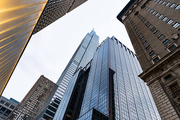 istock Office building in business district with modern skyscraper architecture in metropolis city downtown 2207028862