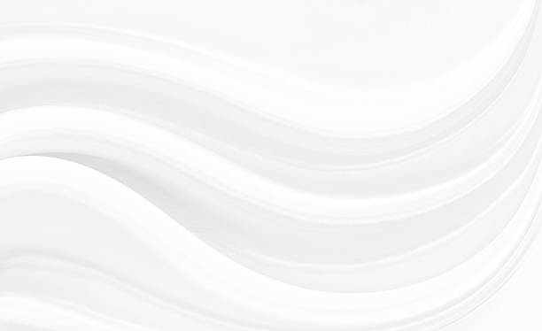istock White gray satin texture that is white silver fabric silk background with beautiful soft blur pattern natural. 2207029599