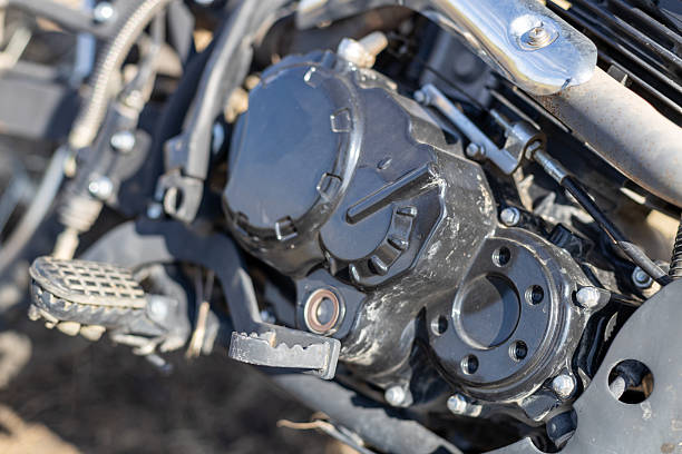 istock A motorcycle engine with a black cover and a black pedal 2207029696