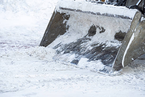 istock The snow plow blade is designed for effectively clearing winter snow from roads and paths 2207030494