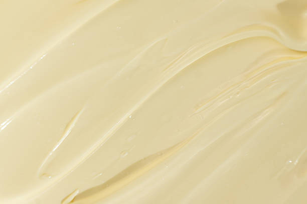 istock Glossy White Mayonnaise Surface. Food Texture Background 2207030982
