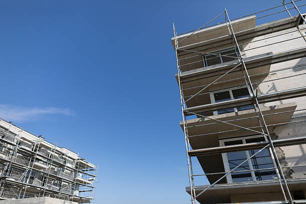 istock A modern building under construction, supported by scaffolding, showcases design innovation 2207032831