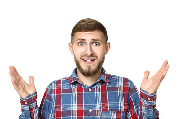 istock Portrait of young surprised man on white background 2207034247