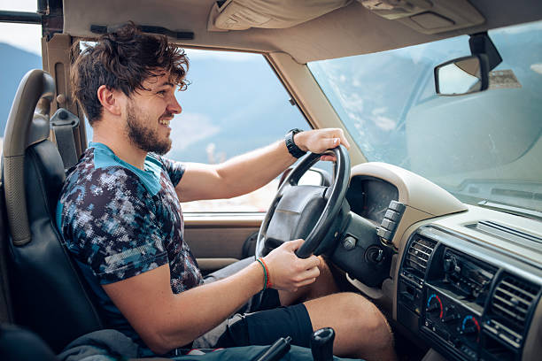 istock Young and positive off road driver. 2207036433