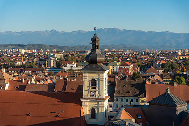 Sibiu, Romania - October 19, 2024: Sibiu from Above: A Tapestry of Red Roofs and Cobbled Streets