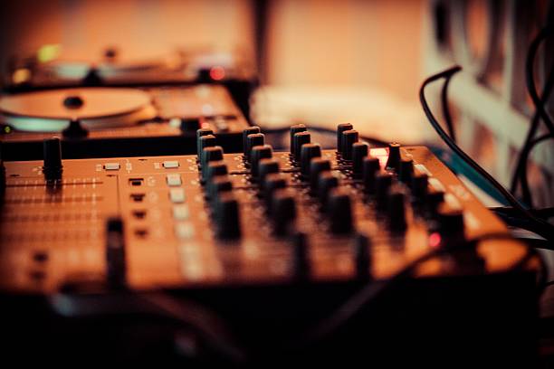 istock Close-Up of DJ Mixer and Turntables 2207041906