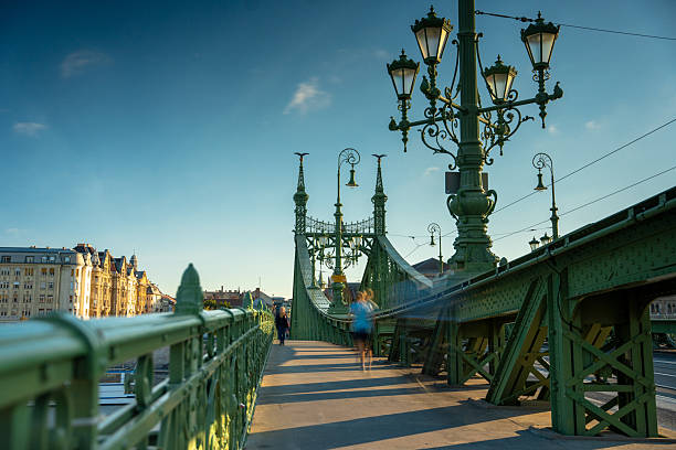 Budapest, Hungary - October 11, 2024: Liberty Bridge in Budapest Bathed in Soft Morning Light.