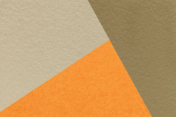 istock Texture craft beige, orange and brown paper background, macro. Structure vintage abstract sand cardboard 2207046008