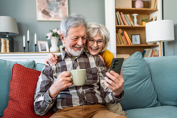 istock Happy senior couple using a smartphone 2207054243