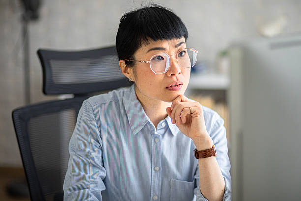 istock Business woman having a problem at office 2207055289
